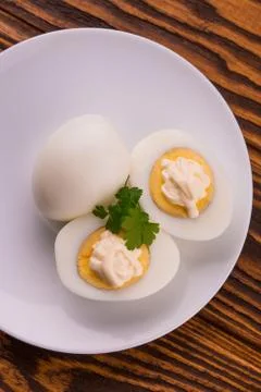 Deviled eggs with parsley in a plate Stock Photos