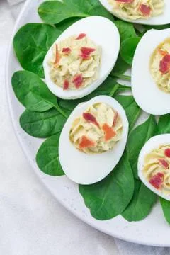 Deviled eggs stuffed with avocado, egg yolk and mayonnaise filling Stock Photos