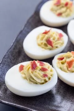 Deviled eggs stuffed with avocado, egg yolk and mayonnaise filling 스톡 사진