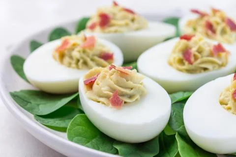 Deviled eggs stuffed with avocado, egg yolk and mayonnaise filling 스톡 사진