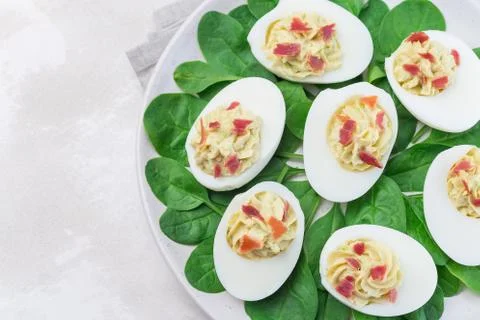 Deviled eggs stuffed with avocado, egg yolk and mayonnaise filling Stock Photos