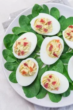 Deviled eggs stuffed with avocado, egg yolk and mayonnaise filling Stock Photos