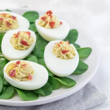 Deviled eggs stuffed with avocado, egg yolk and mayonnaise filling Stock Photos