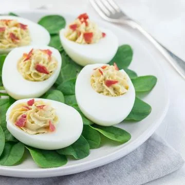 Deviled eggs stuffed with avocado, egg yolk and mayonnaise filling Foto stock