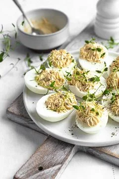 Deviled eggs on a white plate Stock Photos