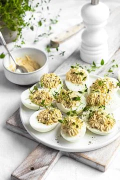 Deviled eggs on a white plate Stock Photos