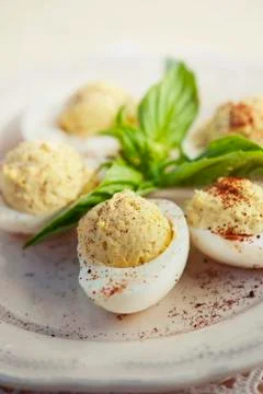 Deviled Eggs on White Serving Dish Stock Photos