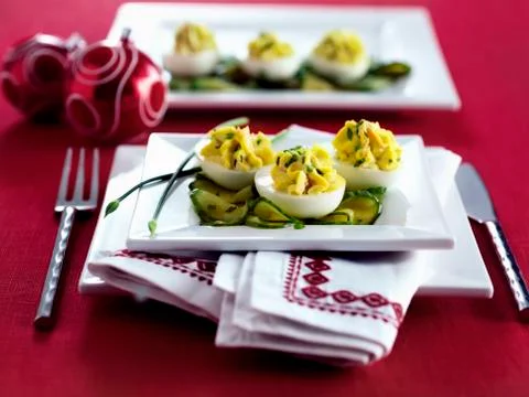 Devilled eggs on cucumber slices 스톡 사진