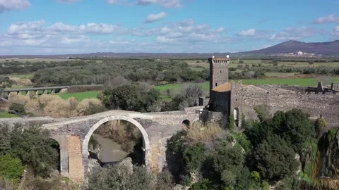 The Devil's Bridge and the Abbadia Castle in Vulci, Canino, Viterbo Stock Footage 149077700
