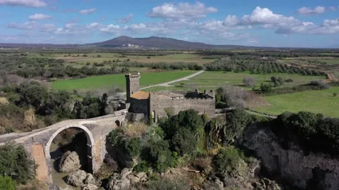 The Devil's Bridge and the Abbadia Castle in Vulci, Canino, Viterbo Stock Footage 149077746