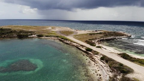 DEVIL'S BRIDGE IN ANTIGUA AND BARBUDA BAD WEATHER AERIAL SHOT DRONE Stock Footage 95166100