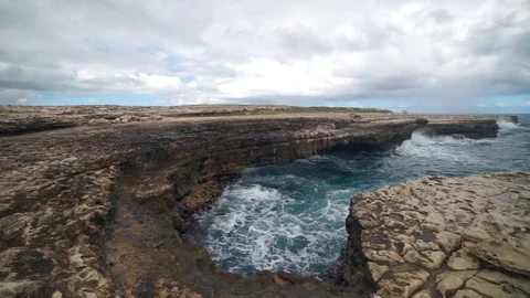 Devil's Bridge bay - Caribbean tropical sea - Antigua and Barbuda Video stock 95348371