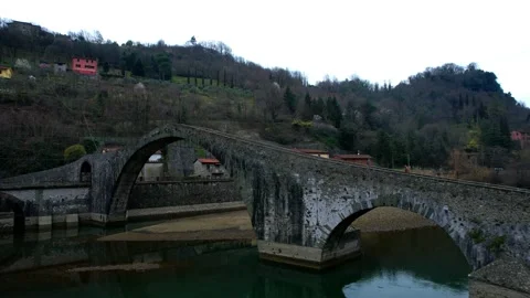 Devil's Bridge Borgo a Mozzano Aerial drone view approach Tuscany Italy  Stock-Footage 184647332