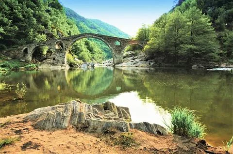 Devil's bridge is a medieval bridge on the riverр Arda, Bulgaria. Stock Photos