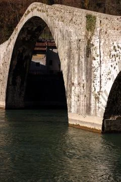 Devil's Bridge or Ponte della Maddalena. Lucca, Borgo a Mozzano. Stock Photos