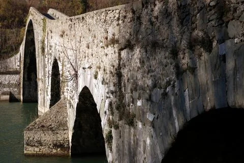 Devil's Bridge or Ponte della Maddalena. Lucca, Borgo a Mozzano. Stock Photos