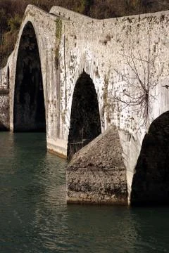 Devil's Bridge or Ponte della Maddalena. Lucca, Borgo a Mozzano. Stock Photos