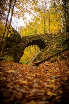 Devil's Bridge - a romantic building in the woods near the village of Mladec  Stock Photos