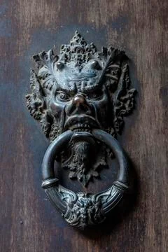 Devil's head bronze knocker door Stock Photos