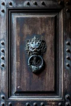 Devil's head bronze knocker door Stock Photos