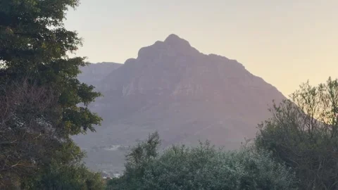 Devil’s Peak and Table Mountain as seen at sunset, from Pinelands in Cape Town. 動画素材 342990866