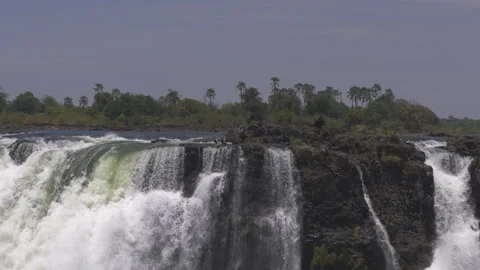 Devil's Pool Adventure at Victoria Falls, Zimbabwe: Exploring the Edge of the Stock Footage 300307205
