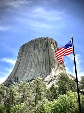 Devil’s Tower, America  Bear Lodge with an American Flag Wyoming Stock Photos