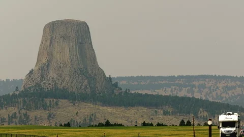 Devils Tower Monument with RV and Truck Stock Footage 328626721