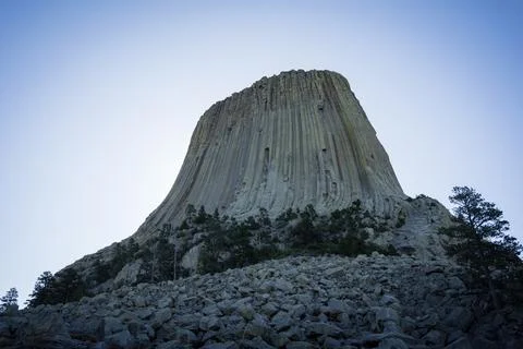 Devils Tower National Monument under a clear blue sky, Wyoming, USA Stock Photos