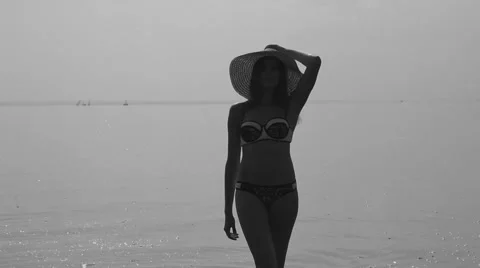 Devk a posing in a swimsuit on the beach Stock Footage 66764556