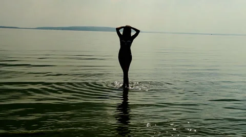 Devk a posing in a swimsuit on the beach Stock Footage 66764626