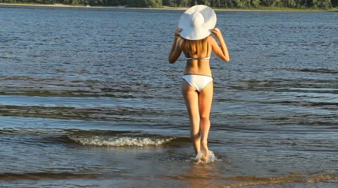 Devk a posing in a swimsuit on the beach Stock Footage 66764717