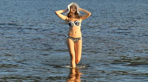 Devk a posing in a swimsuit on the beach Stock Footage 66764849