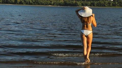 Devk a posing in a swimsuit on the beach Stock Footage 66764927