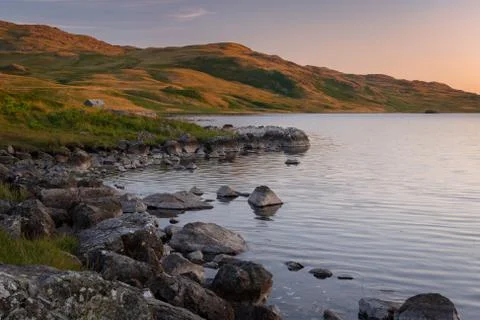 Devoke Water in twilight - beautiful small lake in English Lake District Nati Stock Photos