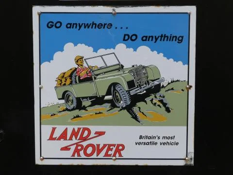 Devon, England - August 17 2018. An old metal Land Rover advert, retro, found at Stock Photos