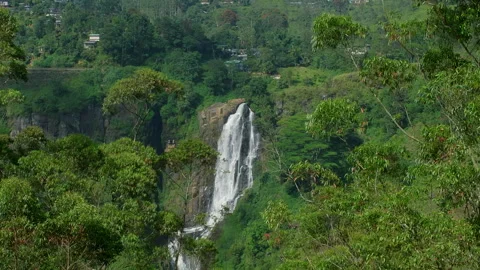 Devon Falls plunging into lush green valley in Sri Lanka Stock Footage 318640401