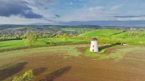 Devon Windmill over fields and farms from a drone, Torquay, Devon, England Stock Footage 240648422