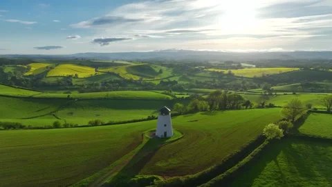 Devon Windmill over fields and farms from a drone, Torquay, Devon, England Stock Footage 240656927