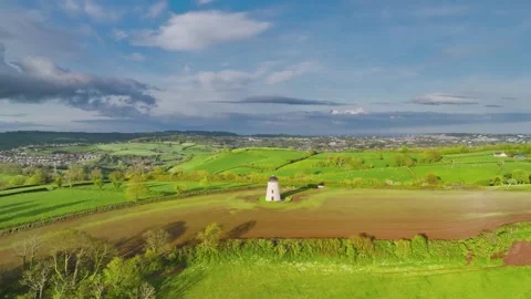 Devon Windmill over fields and farms from a drone, Torquay, Devon, England Stock Footage 240656941