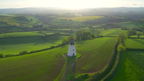 Devon Windmill over fields and farms from a drone, Torquay, Devon, England Stock Footage 240659746