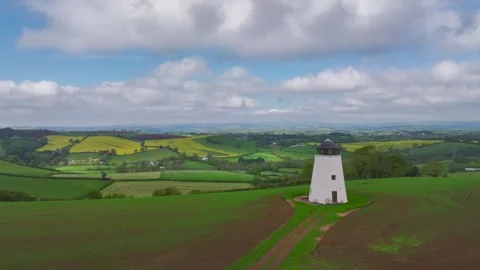 Devon Windmill over fields and farms from a drone, Torquay, Devon, England Stock Footage 241187362
