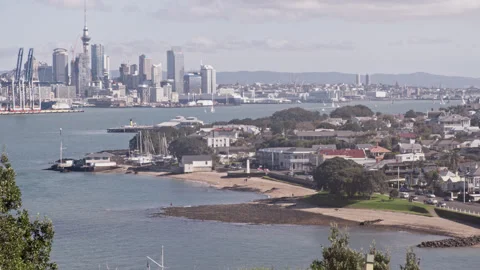 Devonport beach, looking across the channel to Auckland City Stock Footage 247473693