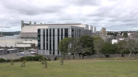 Devonport  dockyard with mobile crane crossing bridge in the dockyard. Stock Footage 136671391