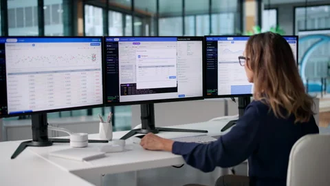 DevOps Engineer Monitors Continuous Integration Pipeline Stock Footage 346929427