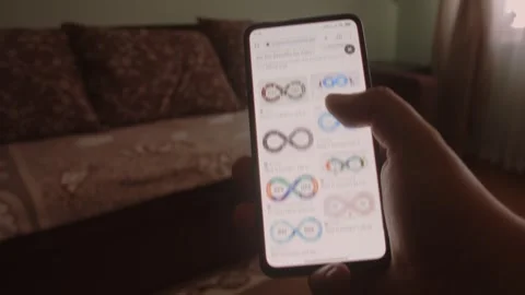 DevOps. Searching information about DevOps on mobile phone screen. Stock Footage 249819152