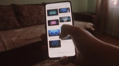 DevOps. Searching information about DevOps on mobile phone screen. Stock Footage 249819538
