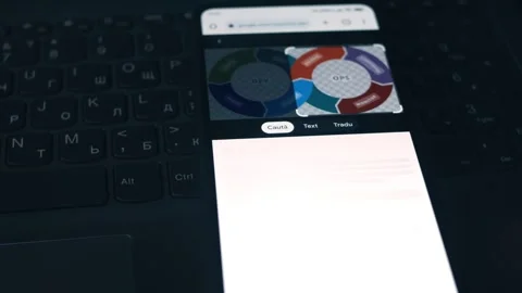 DevOps. Searching information about DevOps on mobile phone screen. Stock Footage 249820200