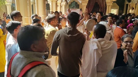 Devotee Dancing During Krishna Name Sankirtan in Iskcon Vrindavan India Stock Footage 129571060