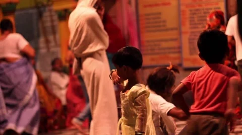 Devotee guests attend a ceremony at the Radha Raman temple, Vrindavana, India. Stock Footage 51108048